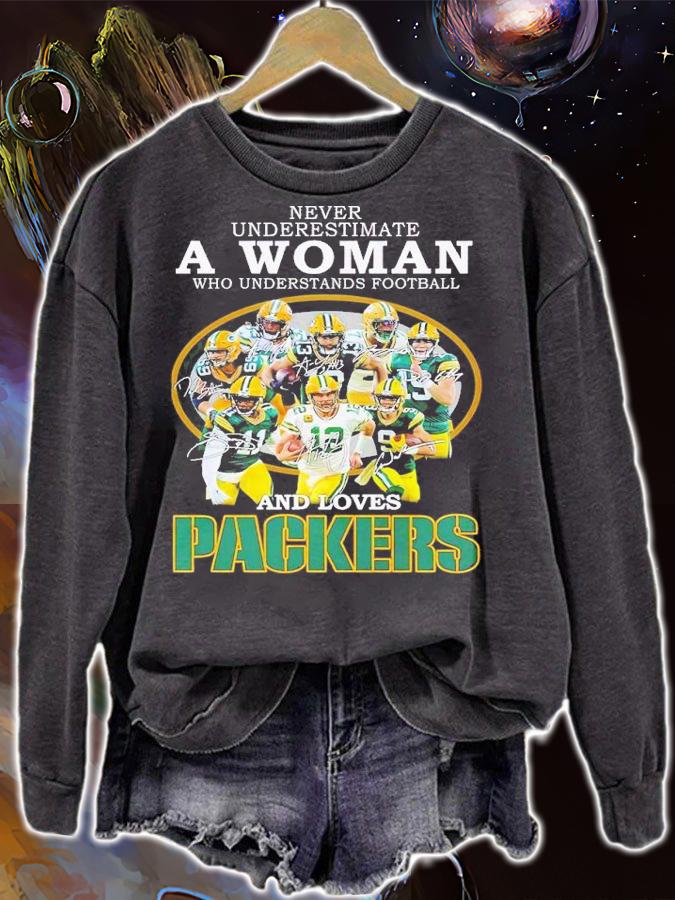 New Never underestimate a woman who understands football and loves Packers shirt t-shirt sweatshirt